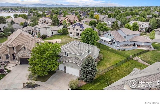 drone / aerial view featuring a mountain view