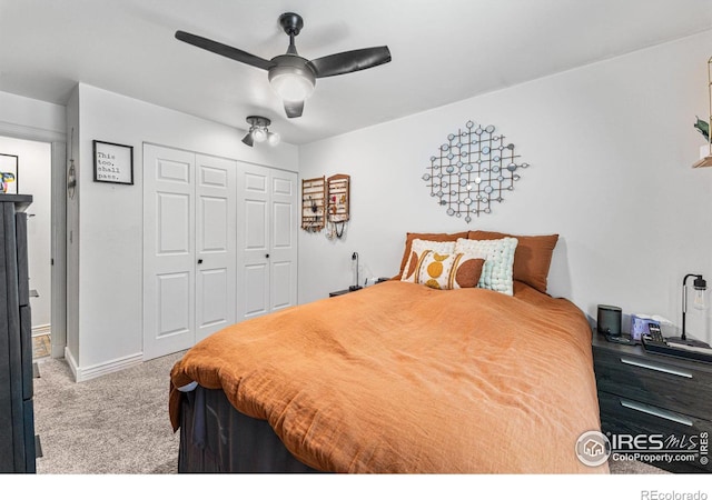 bedroom with light colored carpet, a closet, and ceiling fan