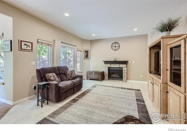133 Eagle Canyon Cir, Lyons, CO 80540 - living room featuring light tile patterned floors and a fireplace