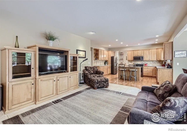 133 Eagle Canyon Cir, Lyons, CO 80540 - tiled living room featuring sink