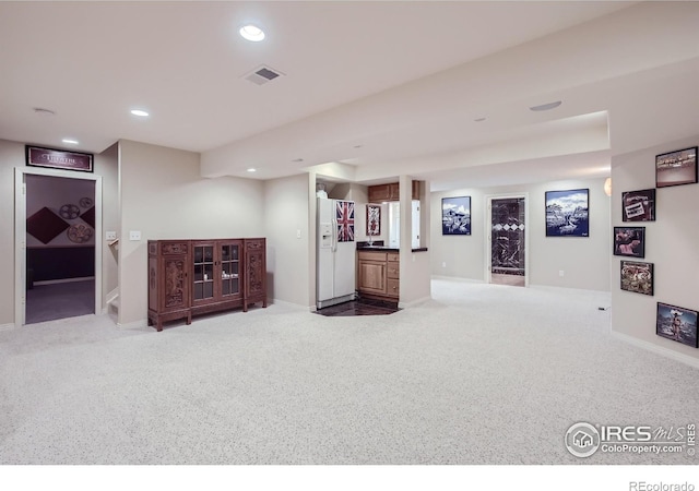 133 Eagle Canyon Cir, Lyons, CO 80540 - basement featuring carpet and white fridge with ice dispenser