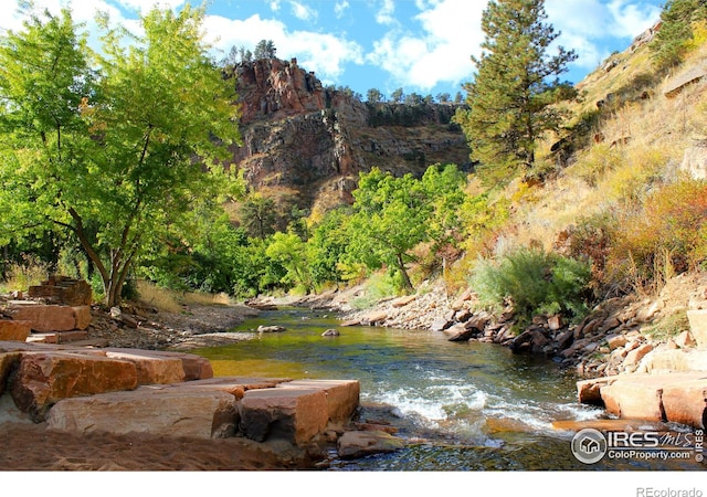 133 Eagle Canyon Cir, Lyons, CO 80540 - property view of water featuring a mountain view