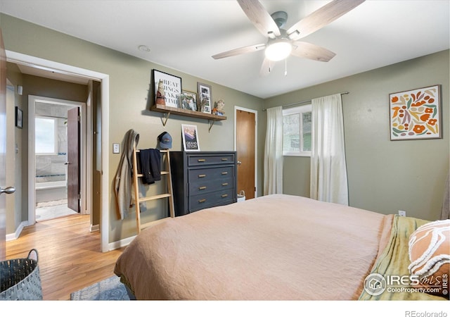 bedroom with ceiling fan and light hardwood / wood-style flooring