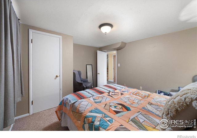 bedroom with carpet flooring