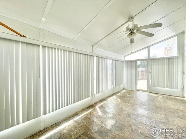 unfurnished sunroom featuring lofted ceiling and ceiling fan