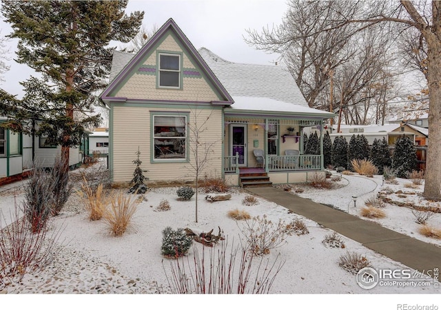 victorian home featuring covered porch