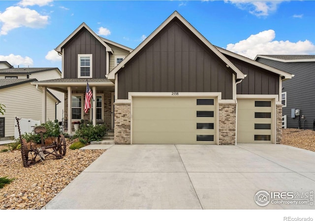 view of front of house with a garage and covered porch