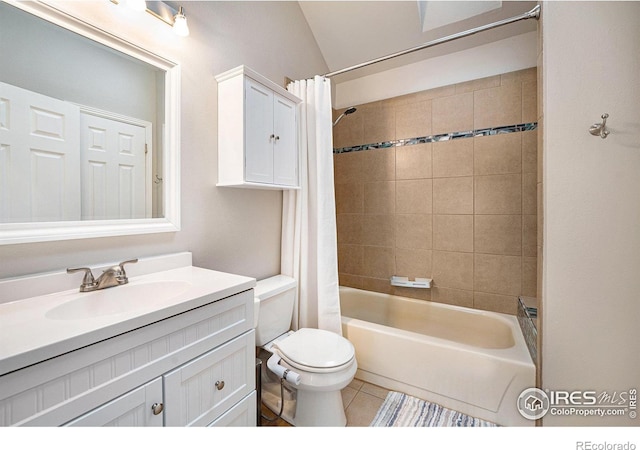 full bathroom featuring vanity, shower / tub combo, tile patterned floors, and toilet