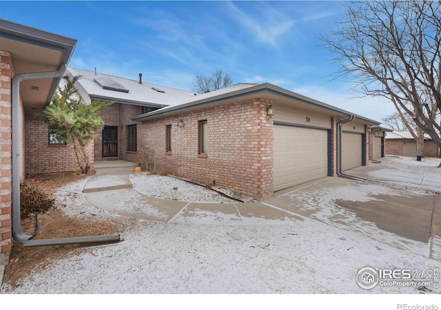 view of property exterior with a garage