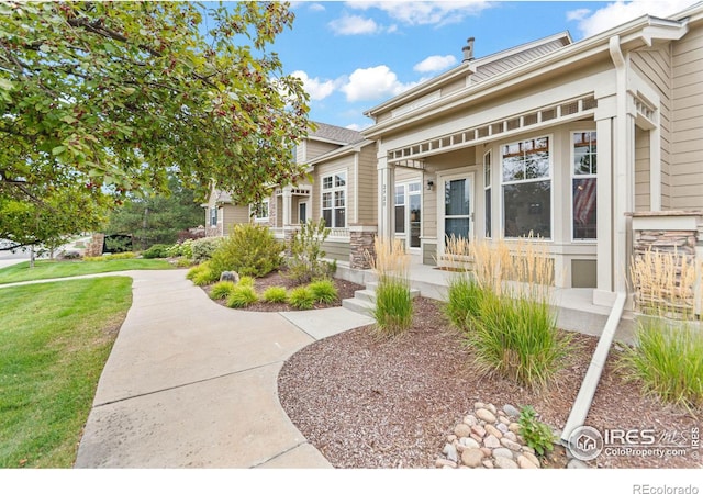 exterior space with a front yard