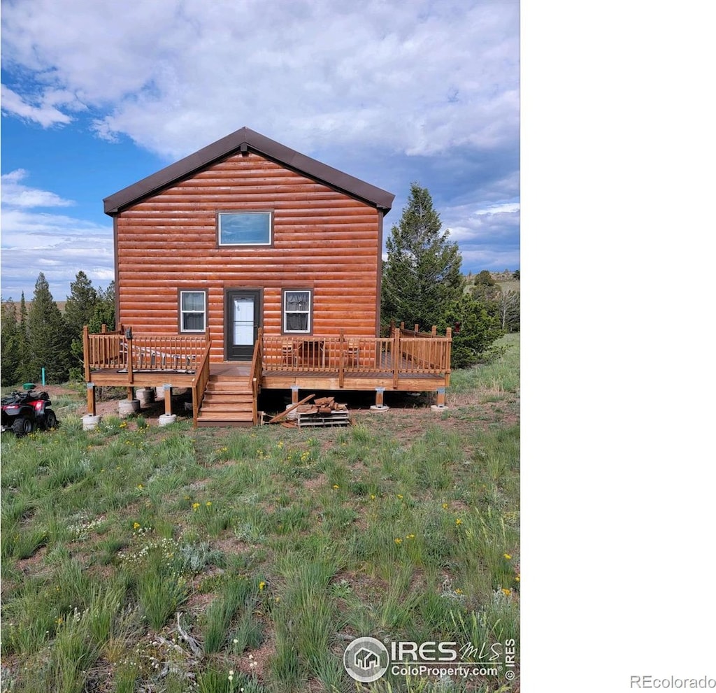 432 Forest Way, Red Feather Lakes, CO 80545 - back of property with a deck