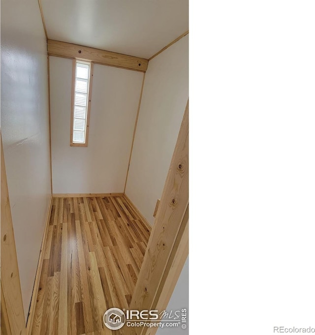 unfurnished room with light hardwood / wood-style floors