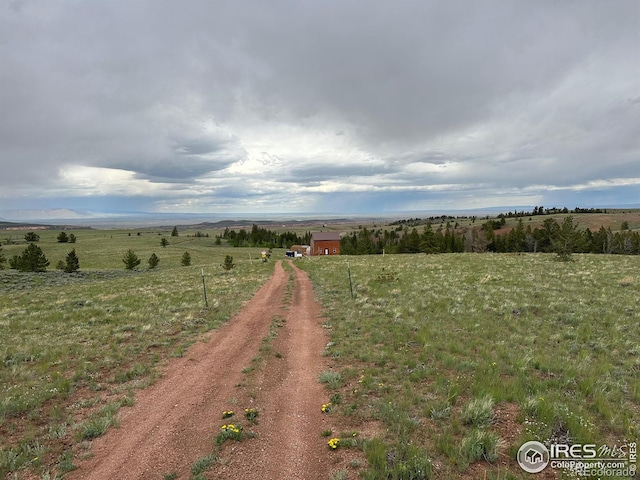 exterior space with a rural view