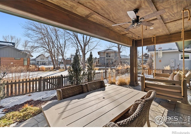 745 Harts Gardens Ln, Fort Collins, CO 80521 - wooden terrace with ceiling fan, a residential view, outdoor dining space, and a patio area