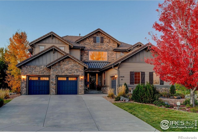 craftsman inspired home with a garage