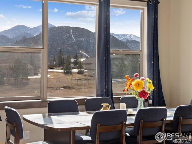 dining area with a mountain view