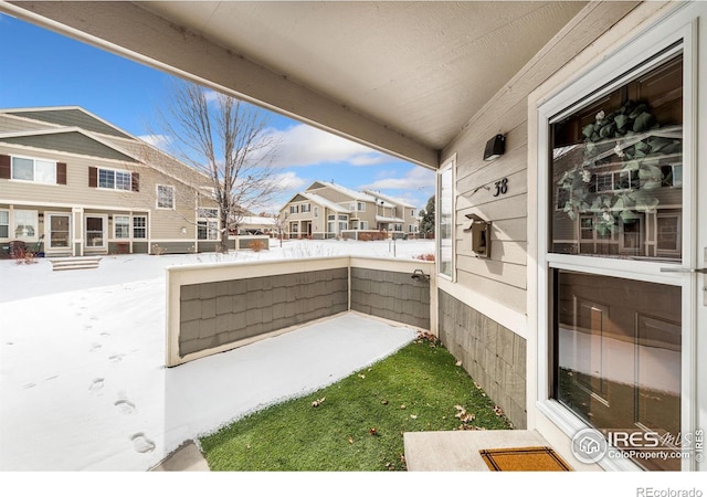 view of patio / terrace featuring a balcony and a residential view