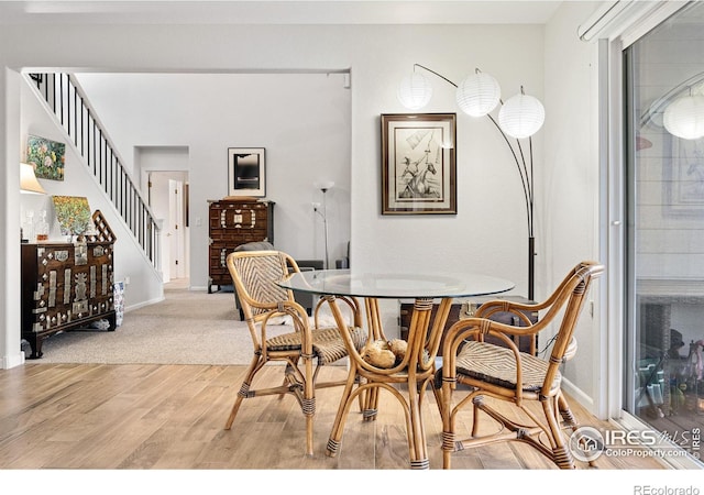 dining area featuring hardwood / wood-style flooring