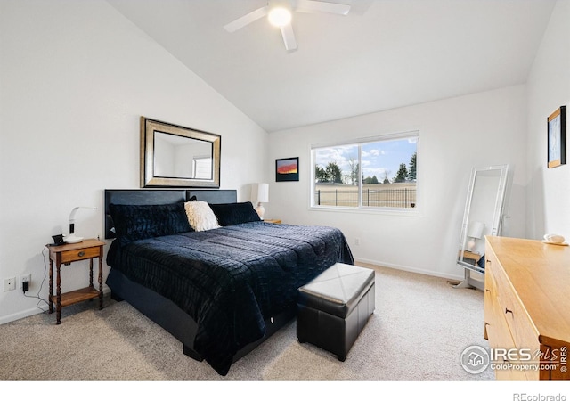 carpeted bedroom with ceiling fan and lofted ceiling