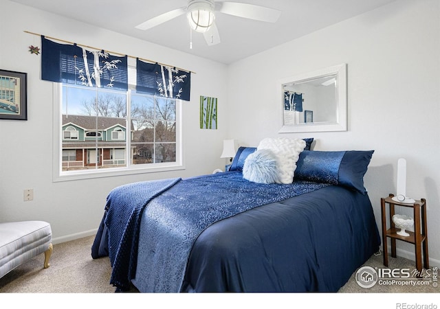 carpeted bedroom featuring ceiling fan