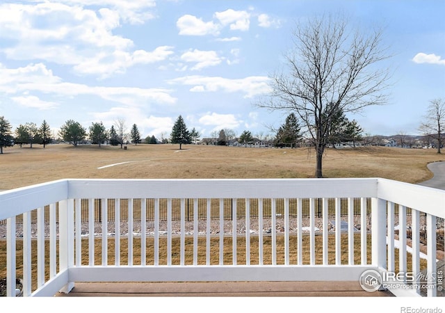 view of yard with a balcony