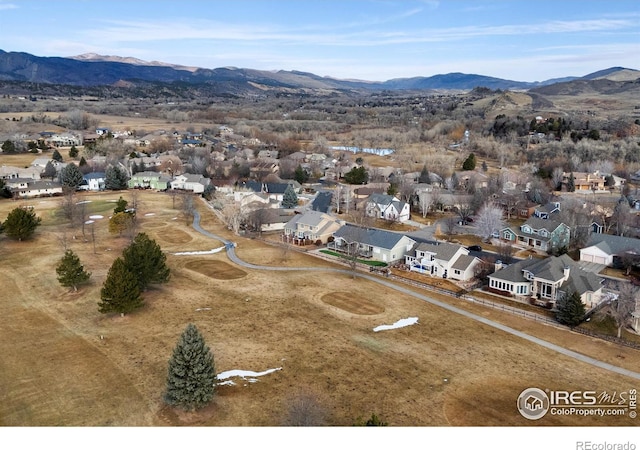 drone / aerial view featuring a mountain view