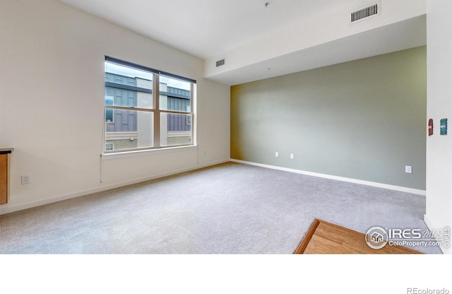 204 Maple St Unit 403, Fort Collins, CO 80521 - carpeted spare room with baseboards