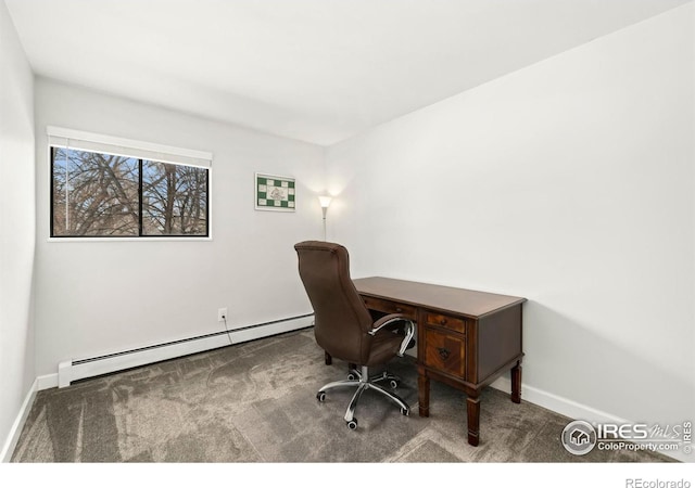 carpeted office with a baseboard heating unit