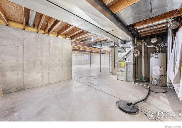 basement with heating unit and gas water heater