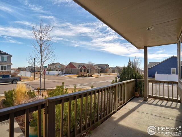 balcony featuring a residential view