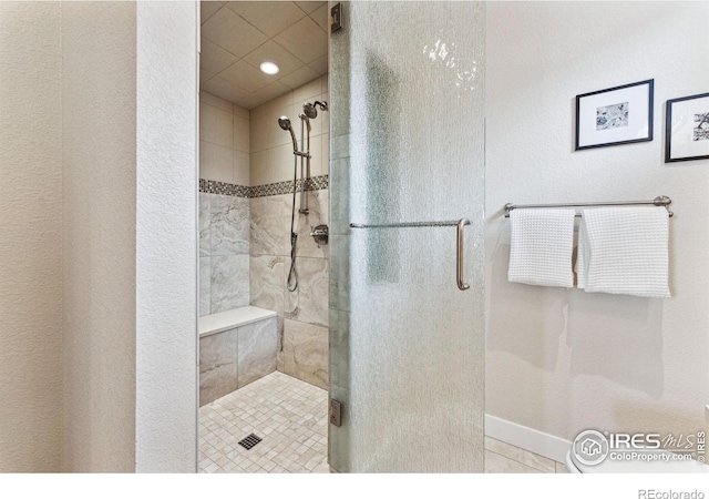 bathroom featuring walk in shower