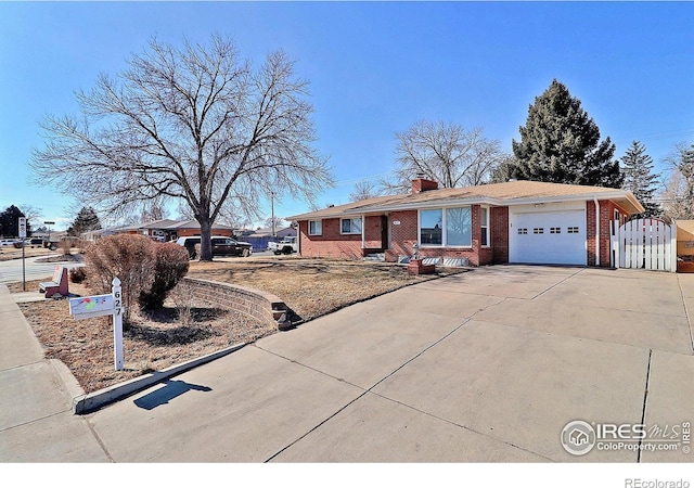 ranch-style home featuring a garage