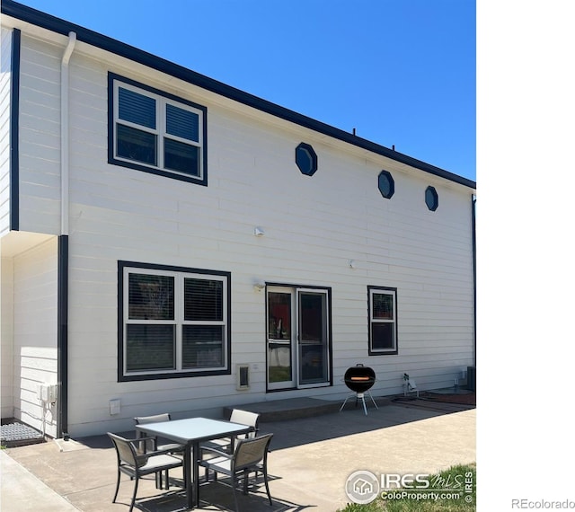 560 S 9th St, Berthoud, CO 80513 - rear view of house with a patio area