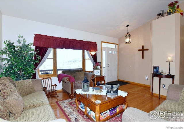 2707 Sedona Hills Dr, Loveland, CO 80537 - living room with wood-type flooring and lofted ceiling