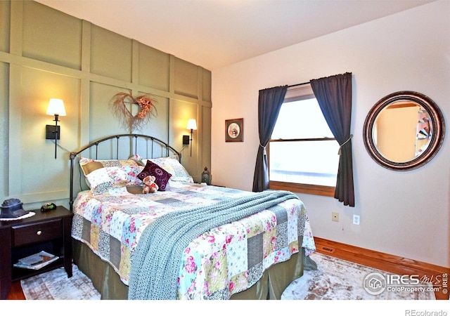 2707 Sedona Hills Dr, Loveland, CO 80537 - bedroom with hardwood / wood-style flooring