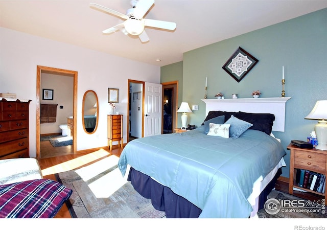 2707 Sedona Hills Dr, Loveland, CO 80537 - bedroom featuring hardwood / wood-style flooring, connected bathroom, and ceiling fan
