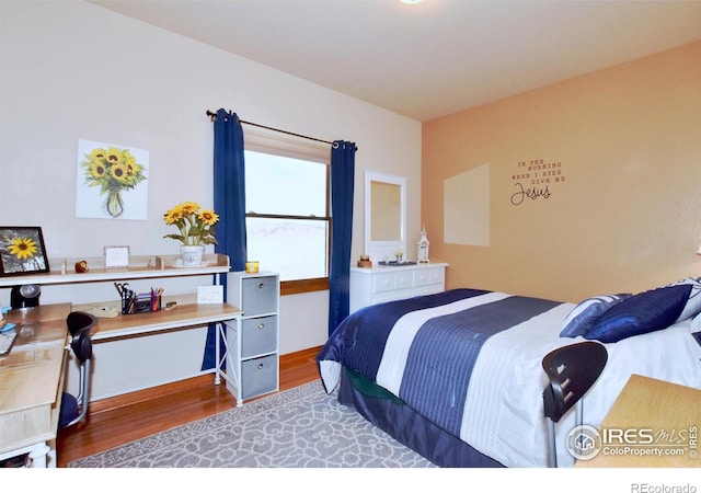 2707 Sedona Hills Dr, Loveland, CO 80537 - bedroom with hardwood / wood-style flooring