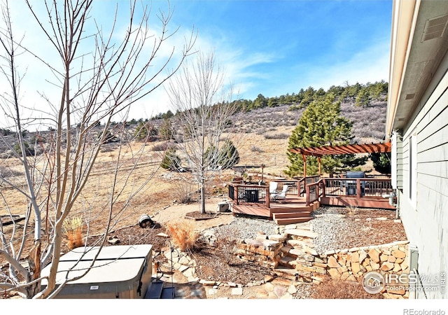2707 Sedona Hills Dr, Loveland, CO 80537 - view of yard with a wooden deck and a pergola