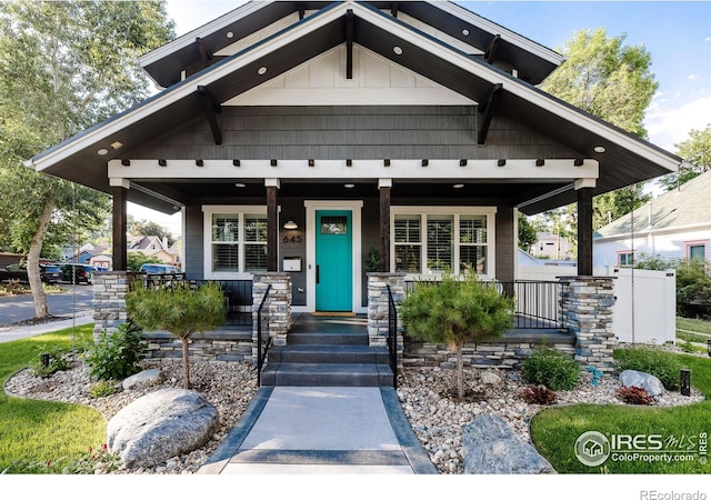 craftsman-style home featuring covered porch