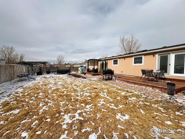 view of yard covered in snow