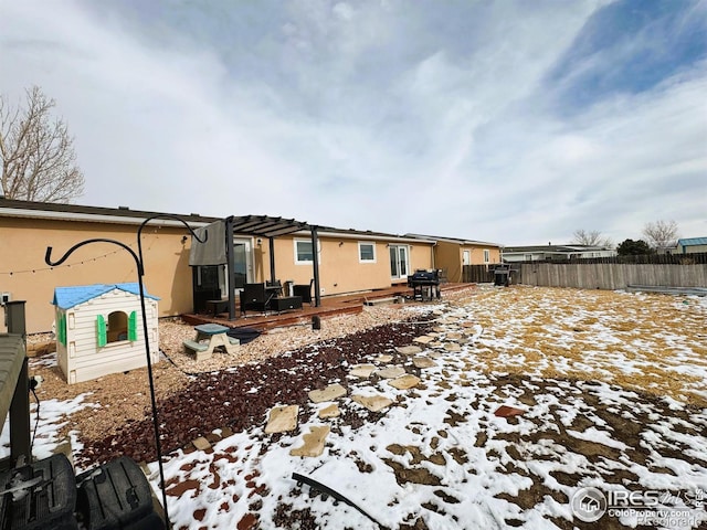 view of snow covered property