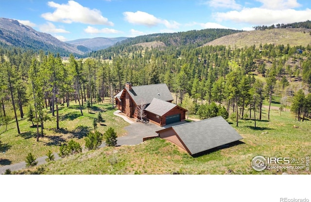117 Crocus Dr, Bellvue, CO 80512 - view from above of property featuring mountains and a heavily wooded area