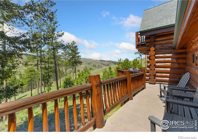 117 Crocus Dr, Bellvue, CO 80512 - wooden terrace with a mountain view