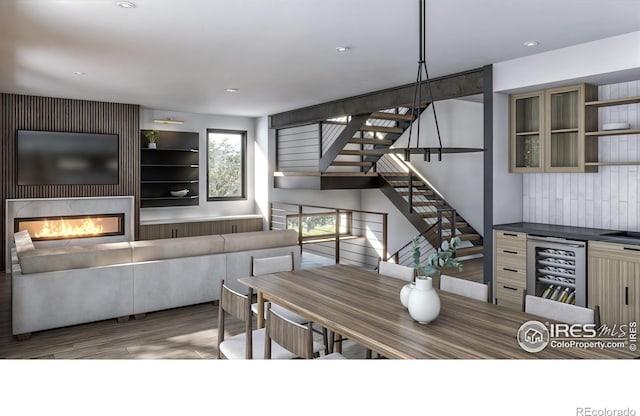 dining space featuring wine cooler and wood-type flooring