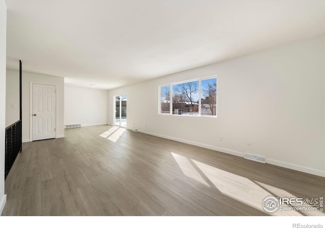 empty room featuring hardwood / wood-style floors