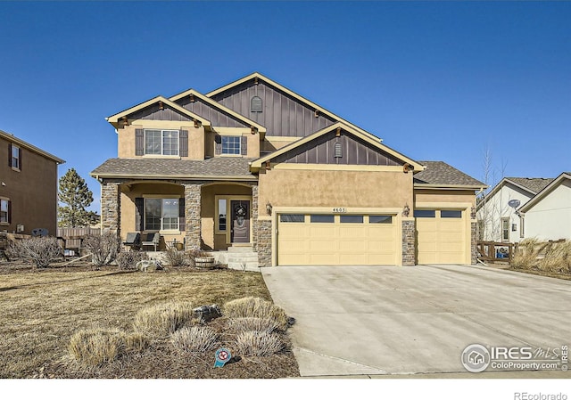 craftsman-style home with a porch and a garage