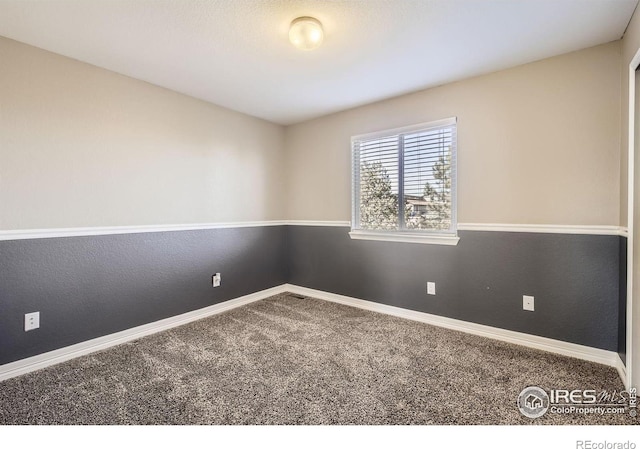 view of carpeted spare room