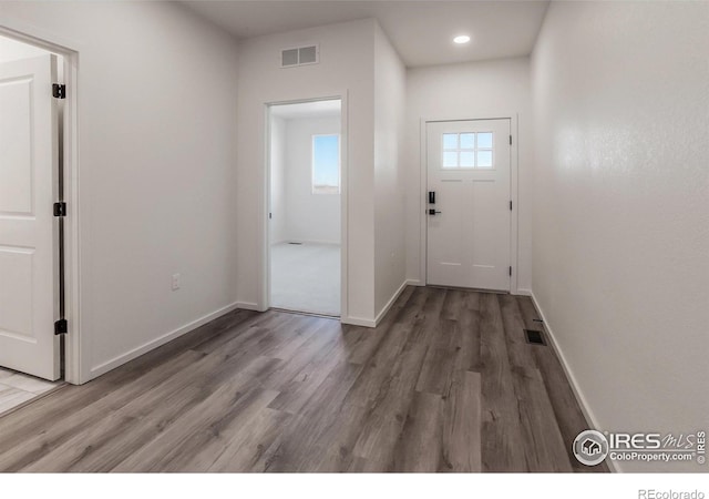 interior space with hardwood / wood-style flooring