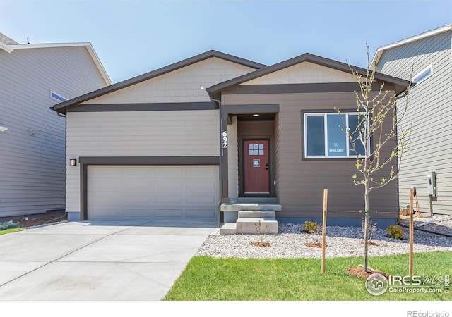 692 Galloway Dr, Johnstown, CO 80534 - view of front facade featuring driveway and a garage