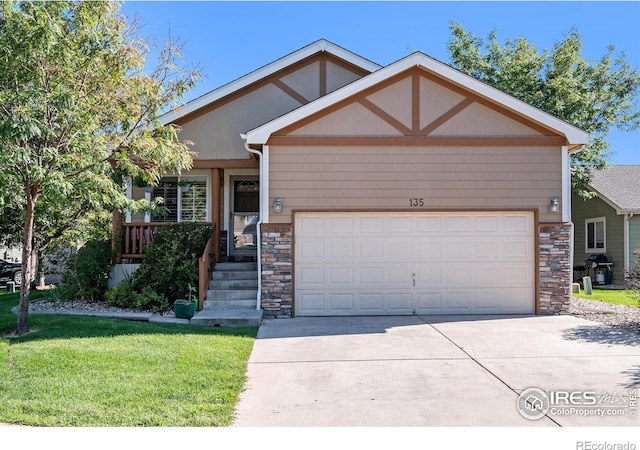 view of front facade with a garage and a front lawn